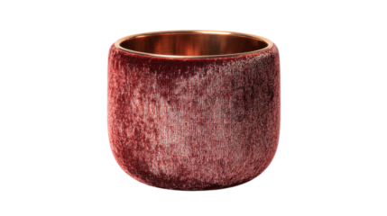 A velvet-wrapped brass luxury whiskey tumbler featuring soft ambient glow elements, white background --ar 16:9