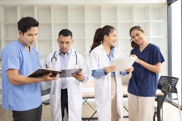 Medical team brainstorming having a meeting in conference room at hospital, Medical technology and...