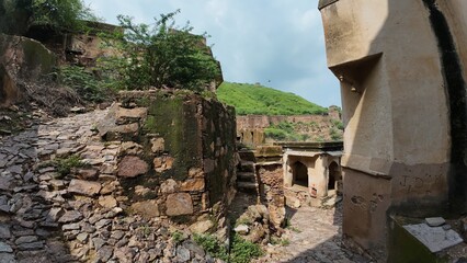 Abandoned Taragarh Fort Ruins with Overgrown Vegetation in Bundi Rajasthan, India 