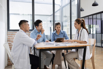 Medical team having a meeting in conference room at hospital, Medical technology and health care concept.