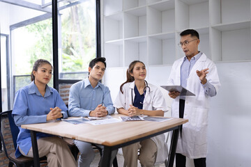 Medical team having a meeting in conference room at hospital, Medical technology and health care concept.