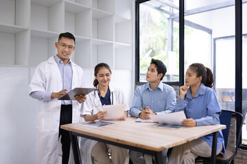 Medical team having a meeting in conference room at hospital, Medical technology and health care concept.