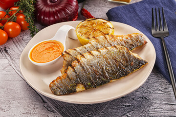 Grilled seabass fillet with lemon