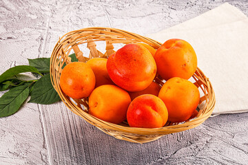 Raw ripe sweet apricots heap