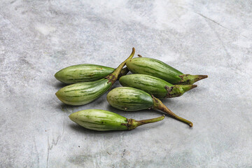 Small organic young green eggplant