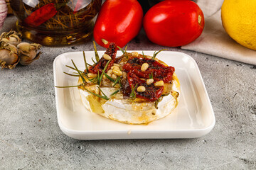 Baked camembert cheese with honey