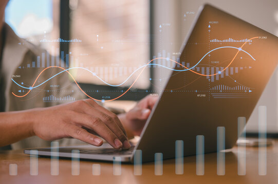 investment financial concept Business finance data analytics graph.Financial management technology.Advisor using KPI Dashboard on virtual screen, man using computer laptop working with data charts