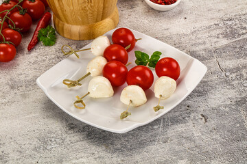 Mozzarella with cherry tomato canape