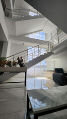 Modern Minimalist Interior with Staircase and Natural Light