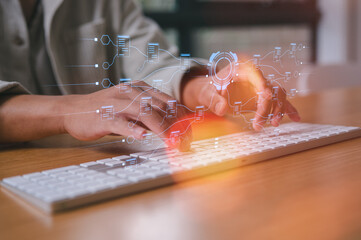 Man hands typing on wireless computer keyboard in modern office or remote work in home office,...