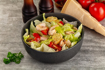 Tasty caesar salad with prawn
