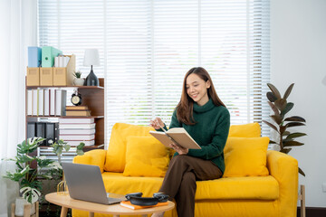 Serene Reading Session: A young woman is immersed in a good book, enjoying a moment of tranquility...