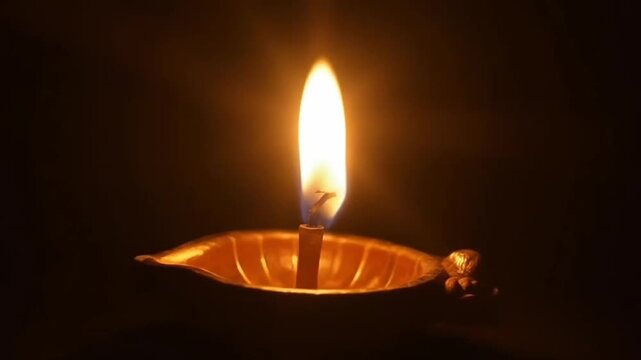 Illuminated Metal Brass Lamp Called Diya Deep Or Dia Glowing With Bokeh. Theme For Diwali, Navratri, Dussehra Puja, New Year, Deepawali, Karva Chauth, Teej, Ganesh Chaturthi Or Shubh Deepavali Pooja S
