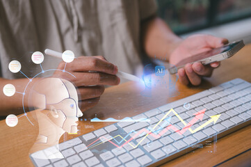 artificial intelligence AI technology and Digital transformation concept, Young asian man working from home use pen and computer keyboard sitting in home office or living room with natural light