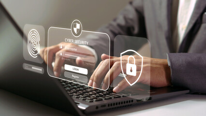 Digital Fortress: A close-up shot of a person’s hands diligently navigating a laptop’s...