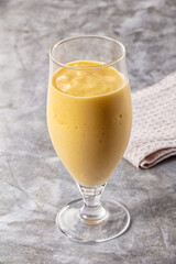Sweet mango smoothie dessert glass