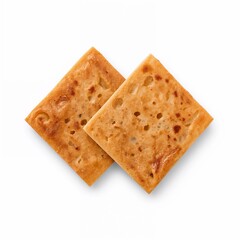 Fototapeta premium Crisp golden tapenade crackers arranged on a white background Concept of isolate