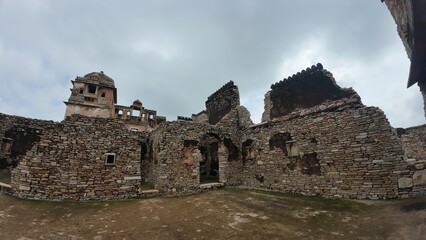Ruins of Rana Kumbha Palace in Chittorgarh Fort Complex, Rajasthan under Cloudy Sky