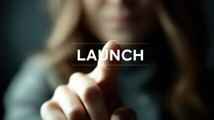 Close-Up of Hand Pressing a Launch Button