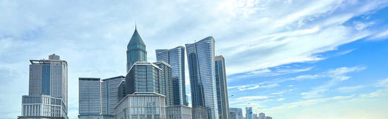 Obraz premium Panoramic View of a Modern City Financial District with Skyscrapers