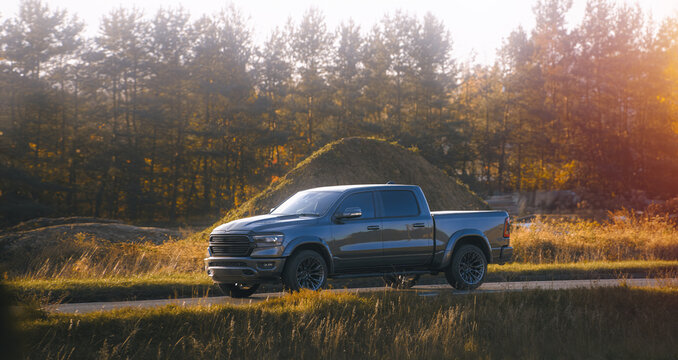 Strong pickup truck parked on dirt path