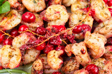 Fried shrimps with berry marinade.