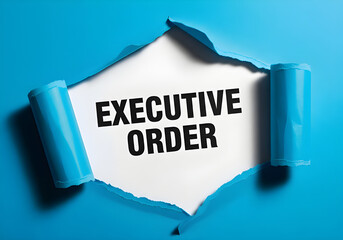 Executive order revealed through torn paper, a key policy announcement.