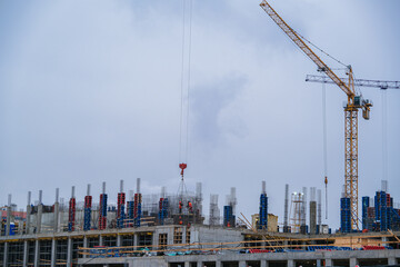 A construction site with a crane in the background