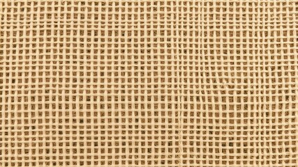 Woven fiber material featuring an open grid pattern creates a texture suitable for backgrounds and abstract design projects