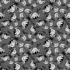 A grayscale seamless pattern features stylized butterflies with intricate wing designs, interspersed with small leafy sprigs, all set against a solid dark grey background.