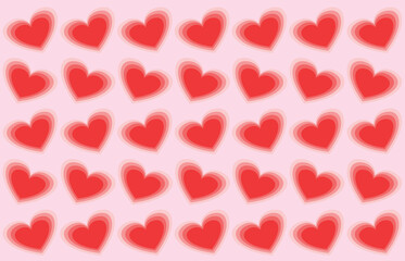 Abstract delicate colored hearts seamless wallpaper pattern on creamy pale pink background as love and happiness concept