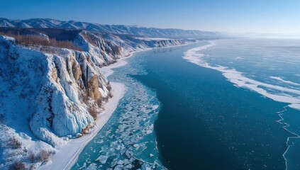 Obraz premium Frozen coastline, dramatic cliffs meet icy water