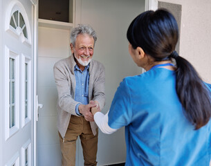 Doctor or nurse caregiver woman with senior man at home or nursing home, a caregiver standing on...