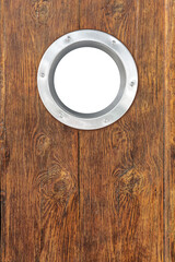 Porthole with transparent background on wooden wall