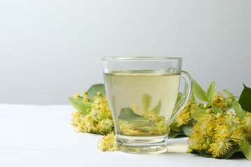 Healthy linden or tilia flower tea in the cup
