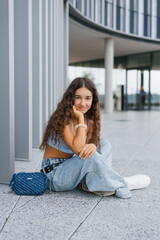 Stylish Teen Girl On Sidewalk