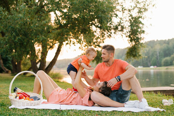 Happy Family Bonding By The Lake