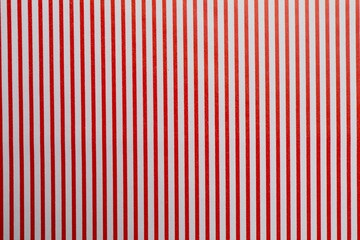 Abstract geometric, striped pattern. Seamless Christmas red background. Peppermint wrapping print. Cute caramel package texture. Xmas holiday diagonal lines. Red white striped background