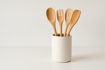 Minimalist Wooden Kitchen Utensils Holder on White Countertop Modern Cooking Concept Clean Design Simple View
