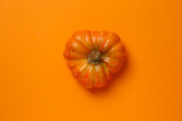 Orange decorative pumpkin. Halloween concept. Top view