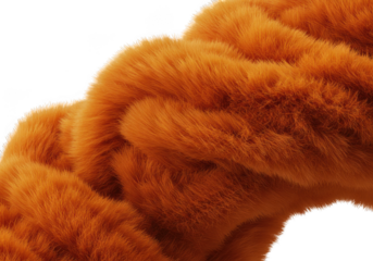 A close up of an orange fiber texture shows a soft and fluffy abstract material surface isolated on transparent background