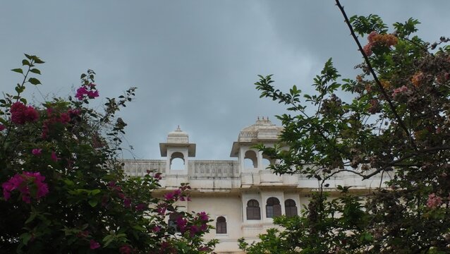 View of Fateh Prakash Palace Behind Floral Bushes in Historic Chittorgarh Fort, Rajasthan