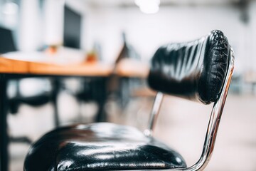 Office chair detail in modern workplace interior
