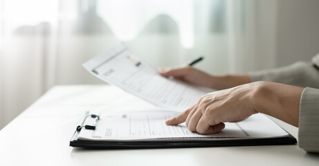 Business woman employer holding resume hiring recruit looking cv resume to hire candidates,...