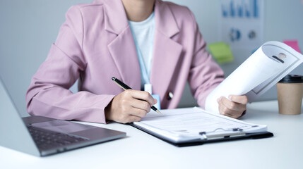 Fototapeta premium Business woman employer holding resume hiring recruit looking cv resume to hire candidates, analyzing information before job interview. Recruitment concepts