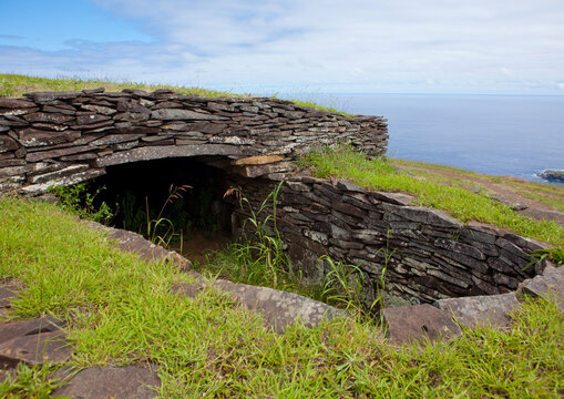 Restored houses in a ceremonial village, Easter Island, Orongo, Chile
