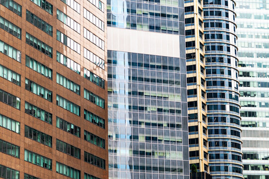 Abstract pattern of reflections with repetitive window textures in Singapore financial district, Asia