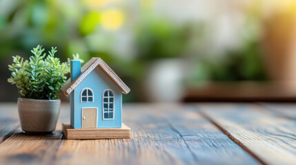 Conceptual overview real estate strategies with miniature house insights