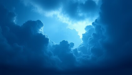 Bright blue sky with fluffy white clouds on a clear day