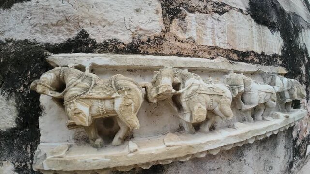 Ornate Mythological Stone Carving on Meera Temple Wall in Chittorgarh Fort Complex, Rajasthan, India